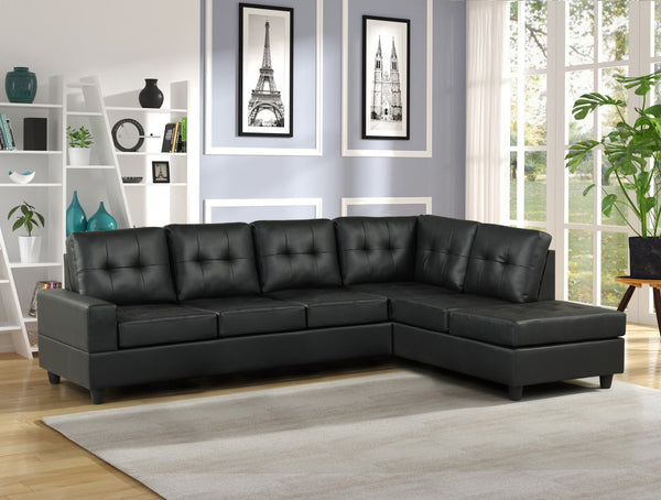 James Black black PU reversible sectional sofa from front angle
