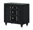 Armany black upholstered nightstand front angle showing glass top