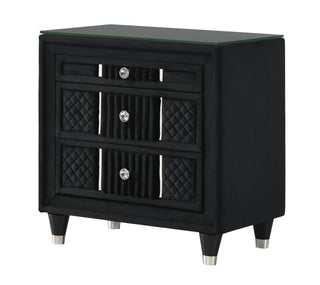 Armany black upholstered nightstand front angle showing glass top