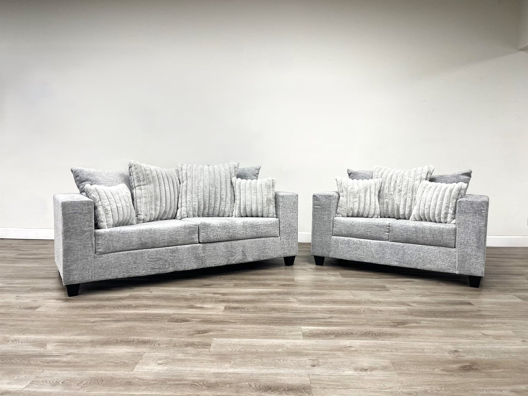 Kaf Gray Living Room Set showing sofa and loveseat in light gray upholstery