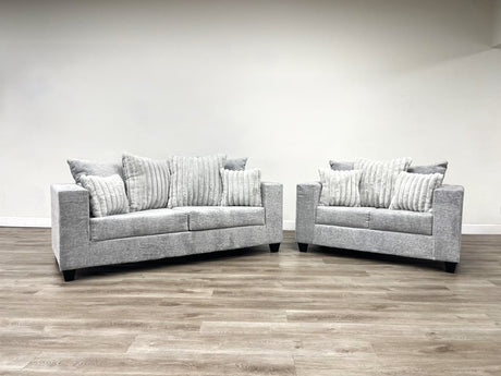 Kaf Gray Living Room Set showing sofa and loveseat in light gray upholstery