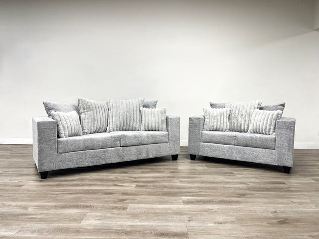 Kaf Gray Living Room Set showing sofa and loveseat in light gray upholstery