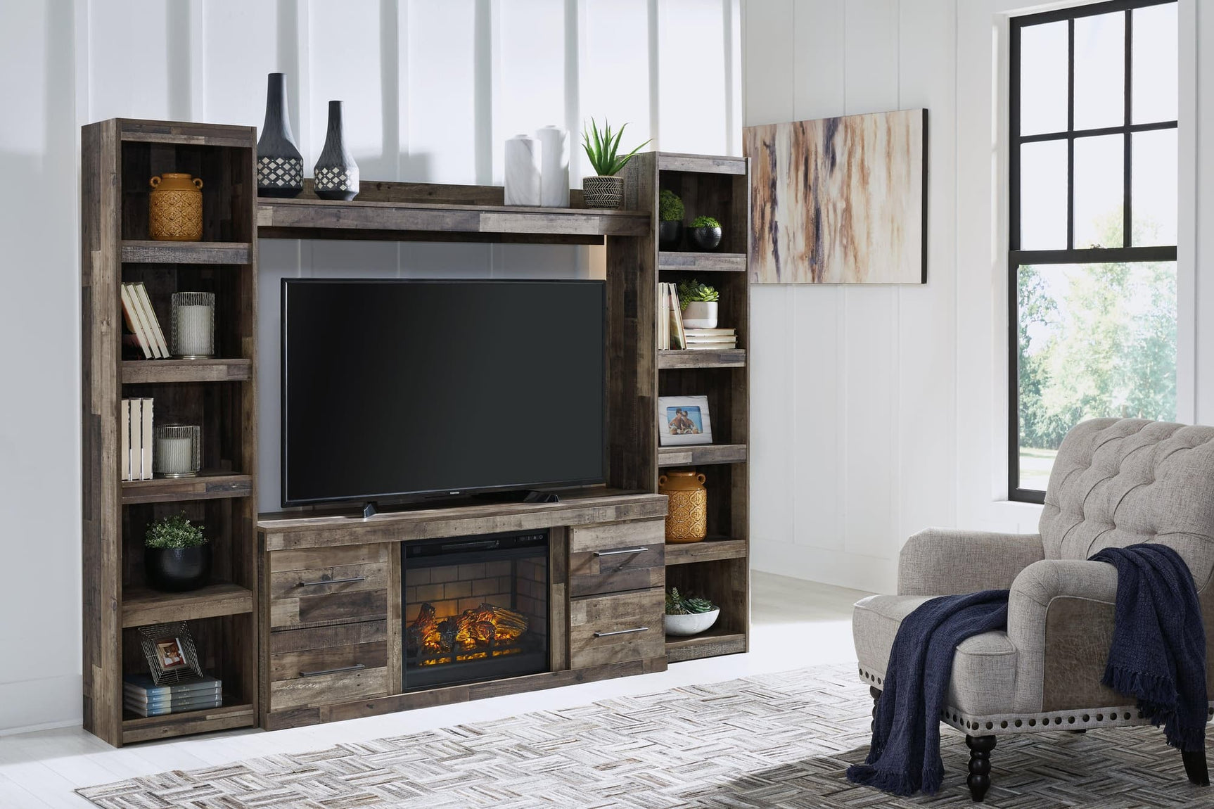 Derekson Multi Gray 4-Piece Entertainment Center with Electric Fireplace front angle