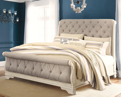 Realyn Chipped White King Upholstered Sleigh Bed front angle