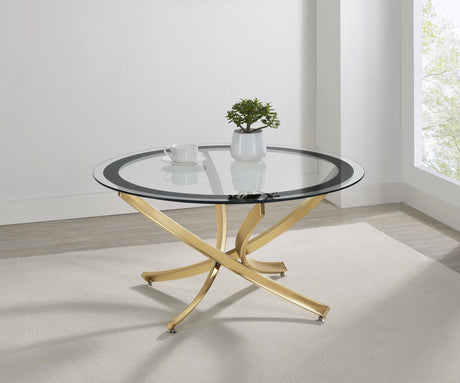 Brooke round coffee table with glass top and rose brass metal base, front view