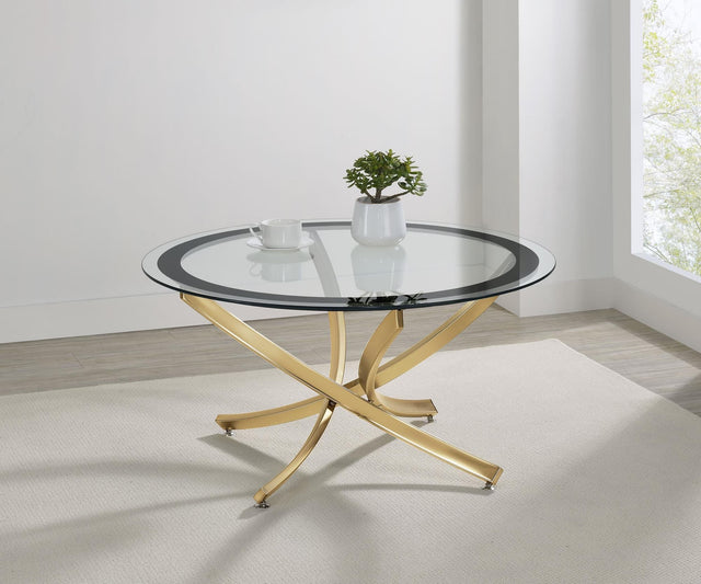 Brooke round coffee table with glass top and rose brass metal base, front view