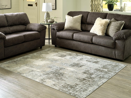 Arriston Multi 7'10" x 10' Rug flat view showing abstract teal, gray, beige, and taupe pattern