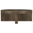 Kinkaid round solid mango wood coffee table in brown, frontal view