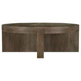 Kinkaid round solid mango wood coffee table in brown, frontal view