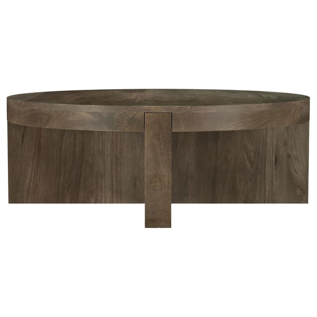 Kinkaid round solid mango wood coffee table in brown, frontal view