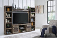 Derekson Multi Gray 4-Piece Entertainment Center front view in living room