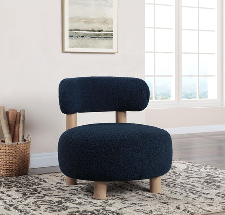 Zonie blue boucle upholstered barrel back accent chair front view