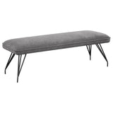 Dodson dining bench front angle with grey fabric upholstery and black hairpin legs