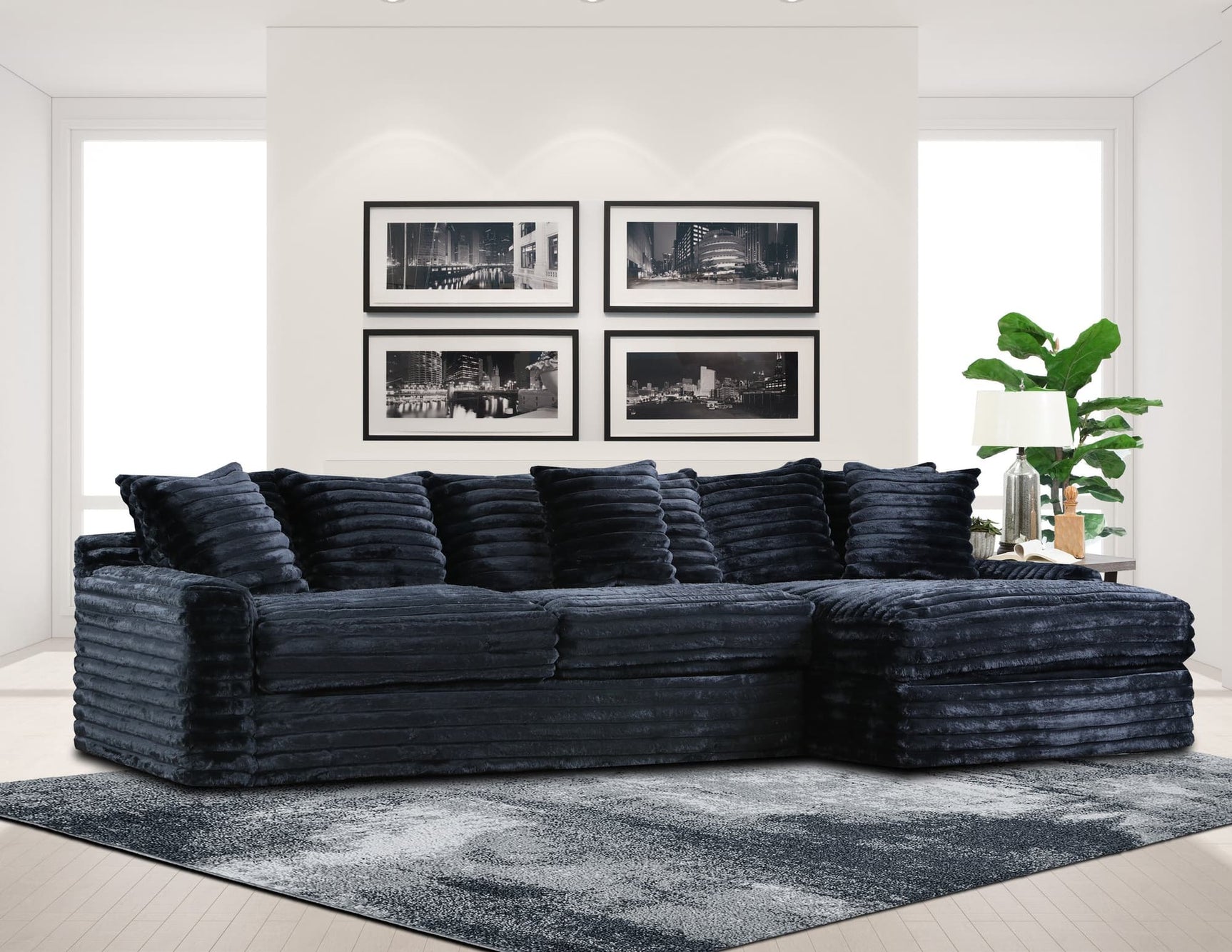 Julia Onyx Black sectional sofa angled view with ottoman