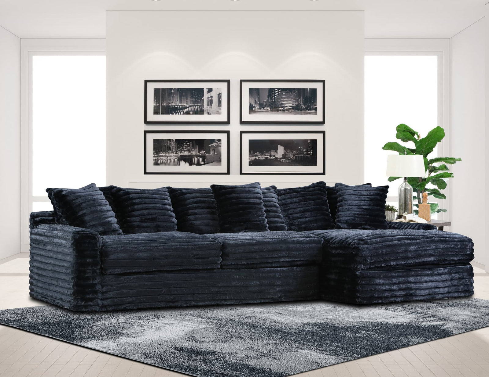 Julia Onyx Black sectional sofa angled view with ottoman
