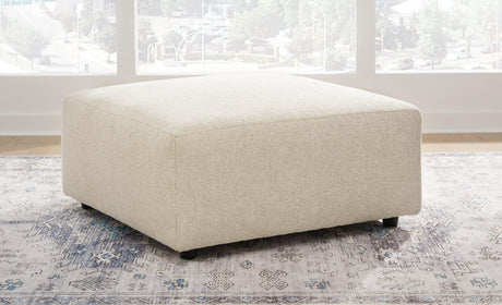Edenfield Oversized Accent Ottoman side angle in linen chenille