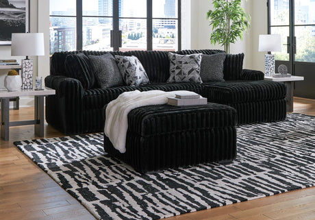 Midnight-Madness Onyx Velvet Oversized Sectional sofa, front angle showing left-arm facing sofa and right-arm facing corner chaise