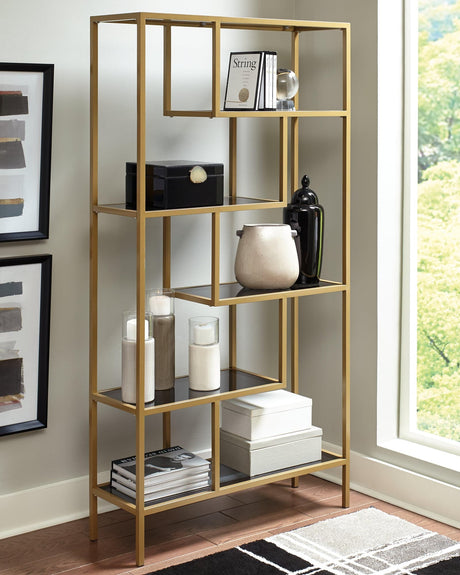 Frankwell bookcase with goldtone frame and gray tinted glass shelves, front angle