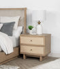 Kailani nightstand in beige oak, front angled view showing two drawers and charging ports