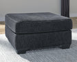 Altari Slate Chenille Oversized Accent Ottoman angled view showing slate fabric and exposed faux wood feet
