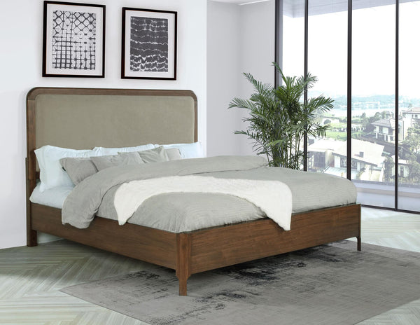 Front view of Maderia 57-inch Upholstered Eastern King Panel Bed in walnut