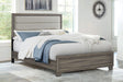 Wright 50-inch Upholstered Eastern King Bed Brown Oak, front view