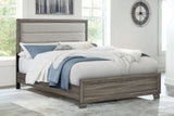 Wright 50-inch Upholstered Eastern King Bed Brown Oak, front view
