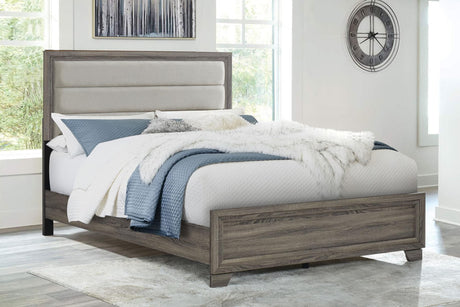 Wright 50-inch Upholstered Queen Bed front view in brown oak