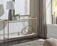 Ryandale Console Sofa Table side view showing antique brass finish and marble shelf