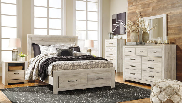 Front view of Bellaby Whitewash Queen Platform Bed with storage drawers closed