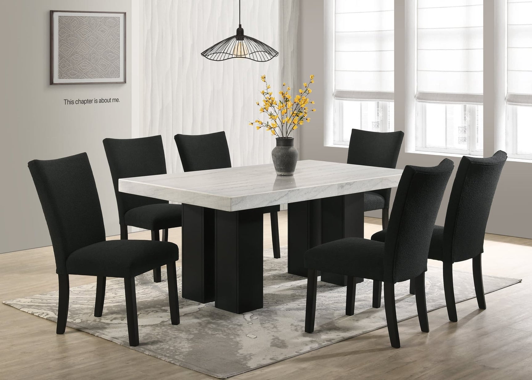 Finley black genuine marble dining table with six black boucle fabric chairs, front angle