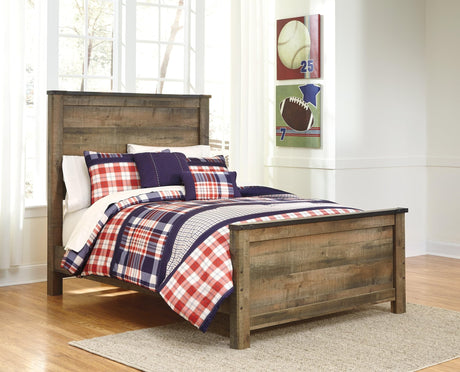 Trinell Brown Full Panel Bed front view showing headboard and nailhead trim