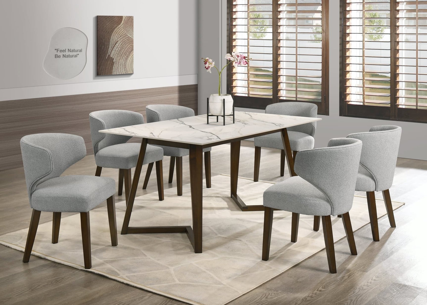 main view of Cava Gray ceramic dining table with six chairs in dining room