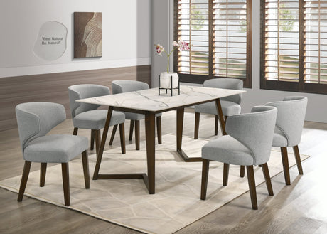 main view of Cava Gray ceramic dining table with six chairs in dining room