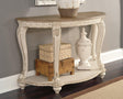 Realyn two-tone white and brown oval sofa table front angle