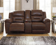 Stoneland Chocolate Faux Leather Power Reclining Loveseat with Console front angle