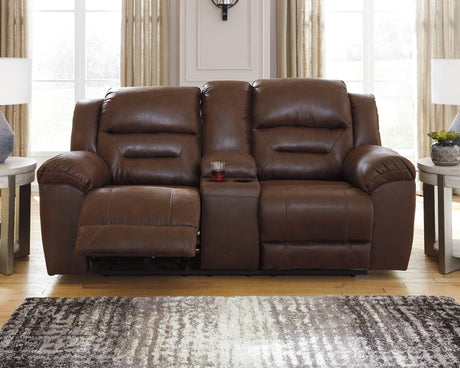 Stoneland Chocolate Faux Leather Power Reclining Loveseat with Console front angle