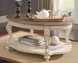 Realyn Oval White Brown Coffee Table front angle