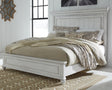 Kanwyn Whitewash Queen Panel Bed front view showing distressed finish