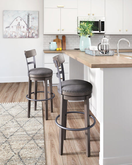 Caitbrook Gray Upholstered Bar Height Swivel Stool front angle view