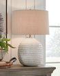 Jamon beige table lamp on side table