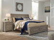 Lettner Light Gray Queen Sleigh Bed front view with storage drawers