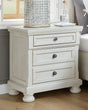 Robbinsdale Antique White Nightstand front angle view