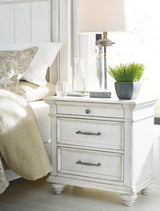 Kanwyn Whitewash Nightstand angled view showing drawers