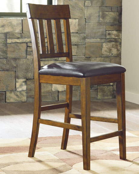 Ralene Medium Brown Upholstered Counter Height Bar Stool front angle