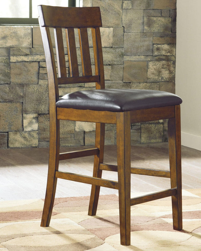 Ralene Medium Brown Upholstered Counter Height Bar Stool front angle