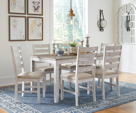 Skempton white and light brown rectangular dining table with six ladderback chairs set up