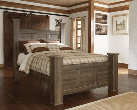 Front view of Juararo Dark Brown King Poster Bed showing intricately carved headboard