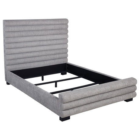 Patricia queen bed upholstered in grey boucle fabric with tall channel-tufted headboard