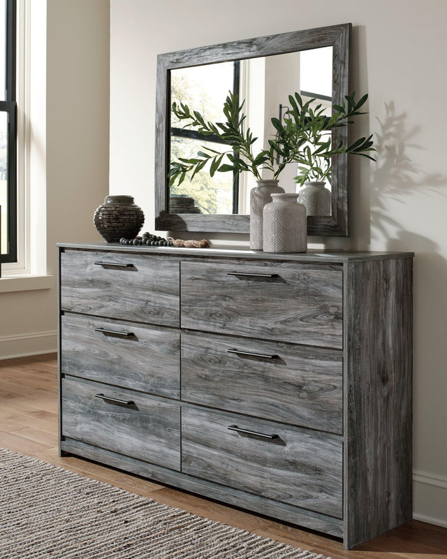 Baystorm Gray 6-drawer dresser and mirror angled front view
